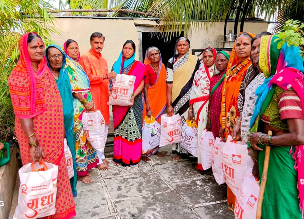 Clothes & Sweets distribution in Dharur village on occasion of Diwali - Kute Group Foundation