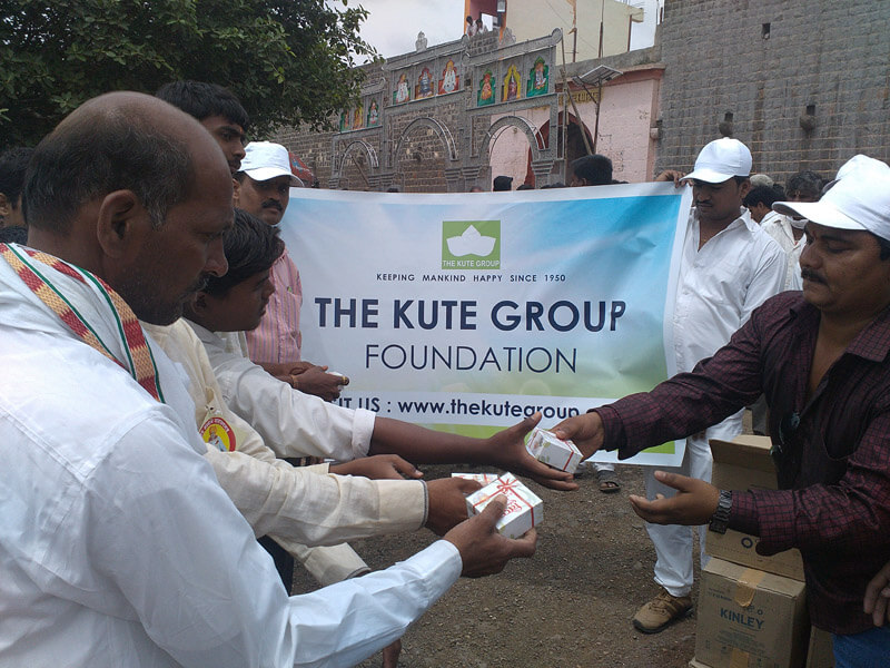 Snacks distribution at Narayangan Temple - Kute Group Foundation